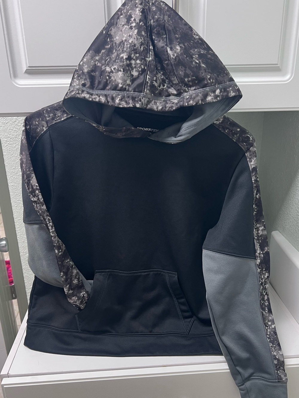 Sport-Tek Kid’s Black Hoodie with Gray Camo Accents